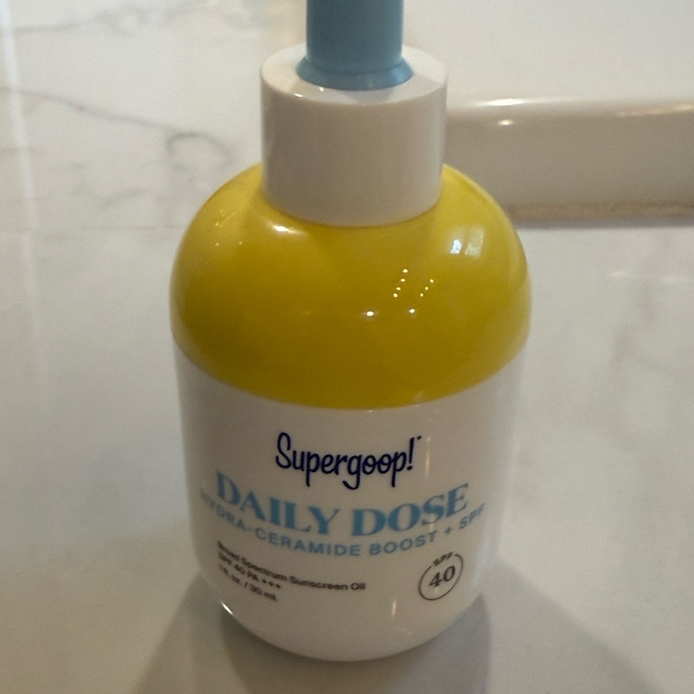 Supergoop! Yellow and White Skincare Suncare